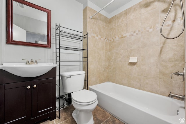 bathroom featuring bathing tub / shower combination, vanity, and toilet