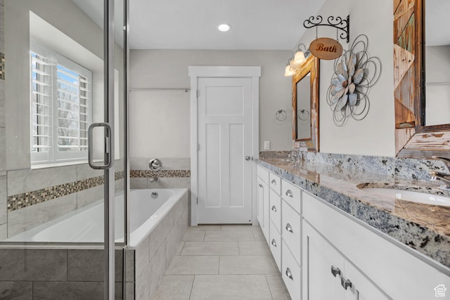 229 S 950 W, Springville, UT 84663 - full bath with a relaxing tiled tub, double vanity, tiled shower, and tile patterned floors