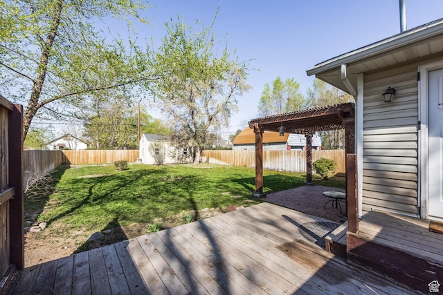 3752 S Mccall St E, South Salt Lake, UT 84115 - wooden deck featuring an outbuilding, a pergola, a storage shed, a fenced backyard, and a lawn