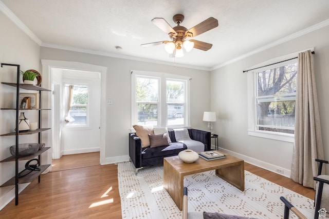 3752 S Mccall St E, South Salt Lake, UT 84115 - living area with light wood-style floors, baseboards, ornamental molding, and ceiling fan