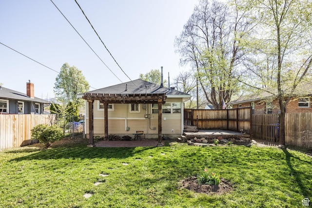 3752 S Mccall St E, South Salt Lake, UT 84115 - rear view of house featuring a pergola, a patio area, a yard, and a fenced backyard