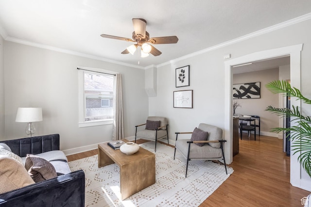 3752 S Mccall St E, South Salt Lake, UT 84115 - living area with ornamental molding, baseboards, a ceiling fan, and wood finished floors