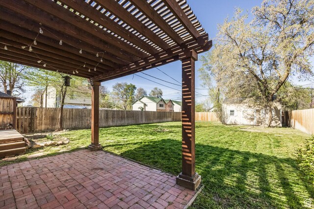 3752 S Mccall St E, South Salt Lake, UT 84115 - view of patio / terrace featuring a pergola, a fenced backyard, a shed, and an outbuilding