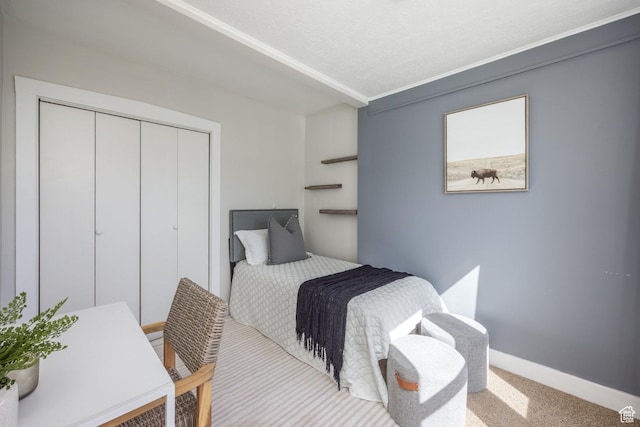 3752 S Mccall St E, South Salt Lake, UT 84115 - carpeted bedroom featuring a closet and baseboards