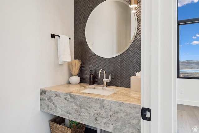 1526 W Orion Way, Heber City, UT 84032 - bathroom featuring vanity, wood finished floors, and a healthy amount of sunlight