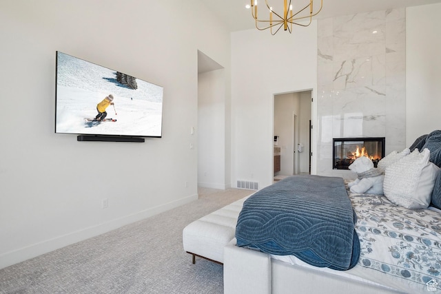 1526 W Orion Way, Heber City, UT 84032 - carpeted bedroom featuring a premium fireplace, a notable chandelier, visible vents, and baseboards