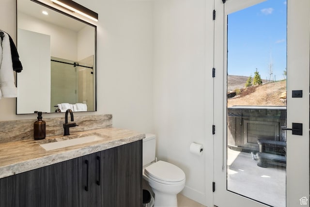 1526 W Orion Way, Heber City, UT 84032 - bathroom featuring toilet, a stall shower, and vanity