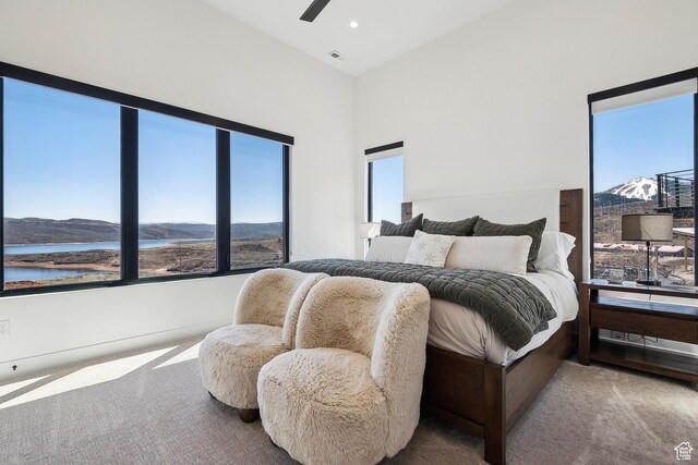 1526 W Orion Way, Heber City, UT 84032 - carpeted bedroom with recessed lighting, a mountain view, visible vents, a ceiling fan, and a towering ceiling