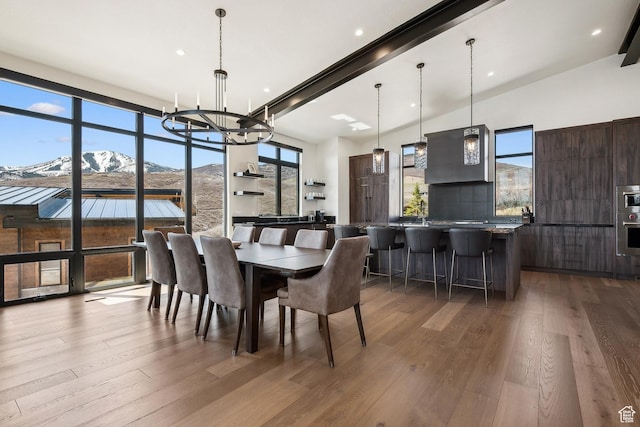 1526 W Orion Way, Heber City, UT 84032 - dining room featuring a mountain view, recessed lighting, wood finished floors, and a chandelier