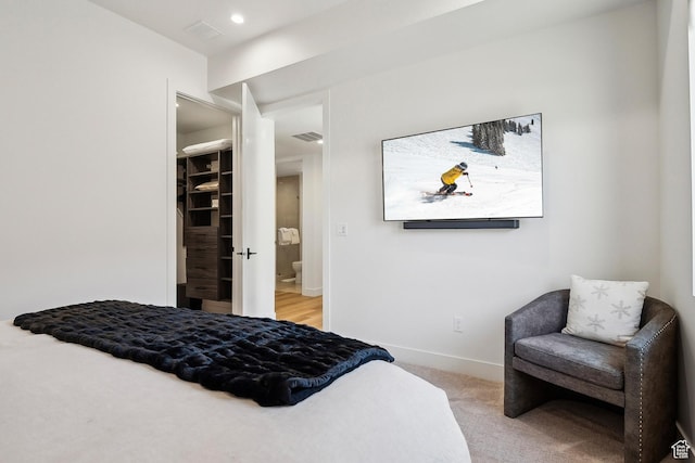 1526 W Orion Way, Heber City, UT 84032 - bedroom with recessed lighting, a walk in closet, visible vents, light carpet, and baseboards