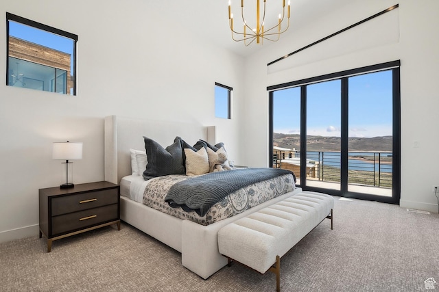 1526 W Orion Way, Heber City, UT 84032 - bedroom with access to exterior, light colored carpet, a chandelier, and baseboards