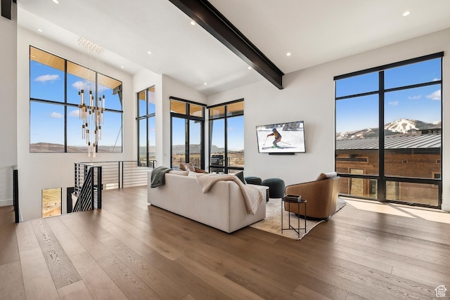 1526 W Orion Way, Heber City, UT 84032 - living room with a wealth of natural light, hardwood / wood-style flooring, and beamed ceiling