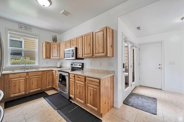 4911 W Calton Ln S, South Jordan, UT 84095 - kitchen featuring a sink, visible vents, light countertops, and stainless steel appliances