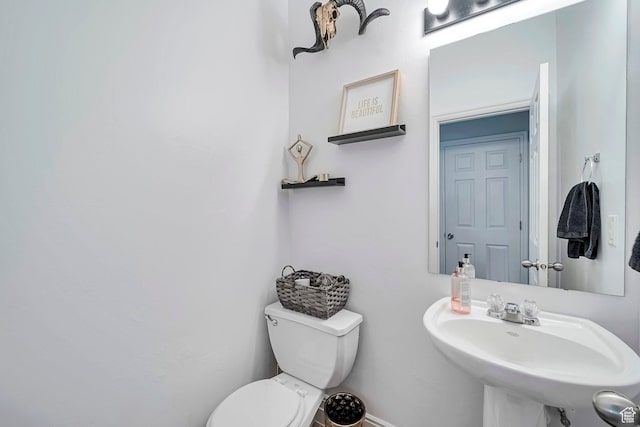 4911 W Calton Ln S, South Jordan, UT 84095 - bathroom with baseboards, a sink, and toilet