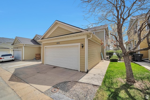 4911 W Calton Ln S, South Jordan, UT 84095 - view of front of property with a front lawn and a garage