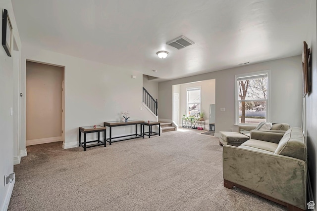 4911 W Calton Ln S, South Jordan, UT 84095 - sitting room with carpet floors, baseboards, visible vents, and stairs