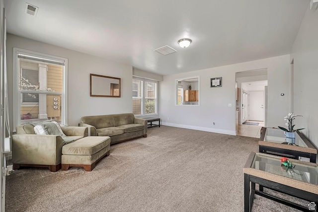4911 W Calton Ln S, South Jordan, UT 84095 - living area featuring visible vents, baseboards, and light colored carpet
