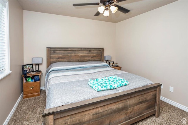 bedroom with baseboards, carpet flooring, and ceiling fan