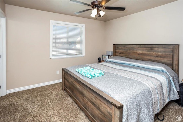 bedroom featuring ceiling fan, carpet flooring, and baseboards