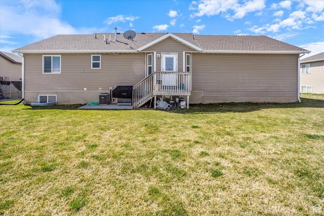 back of house with a patio area, cooling unit, and a lawn