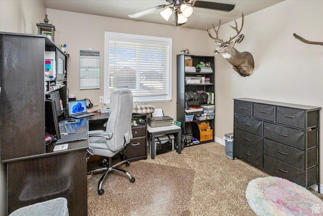 office with ceiling fan and light colored carpet