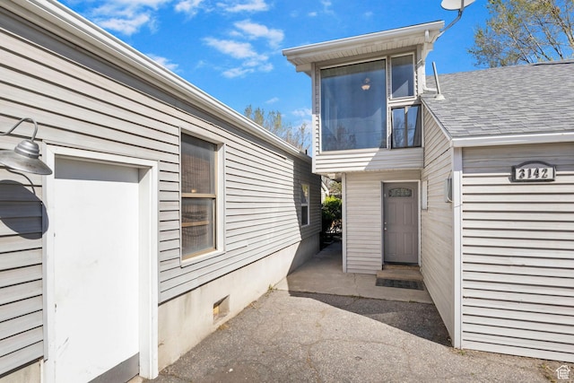 view of exterior entry with crawl space