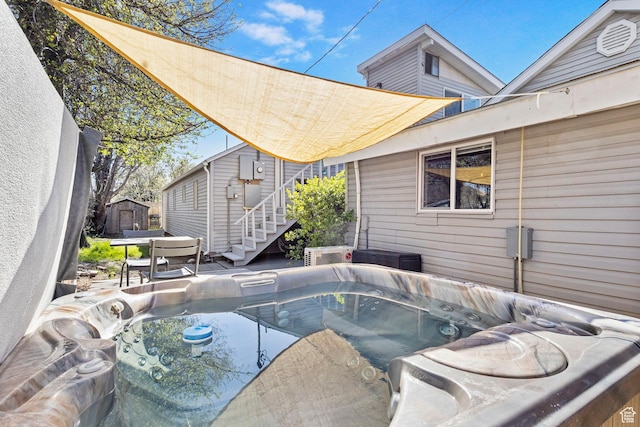 view of patio featuring a hot tub