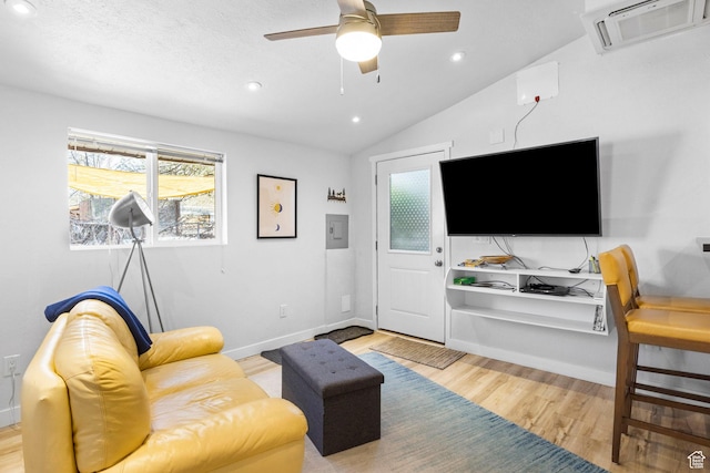 living room featuring visible vents, a ceiling fan, recessed lighting, vaulted ceiling, and wood finished floors