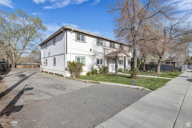 3618 S 300 E Unit A, Salt Lake City, UT 84115 - view of front of house with stucco siding and driveway