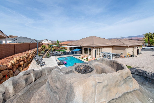 view of swimming pool with a patio, a fenced backyard, and a fenced in pool