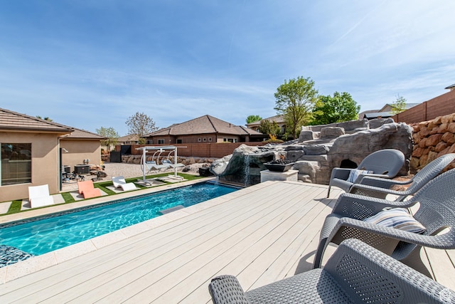 exterior space with fence and a fenced in pool
