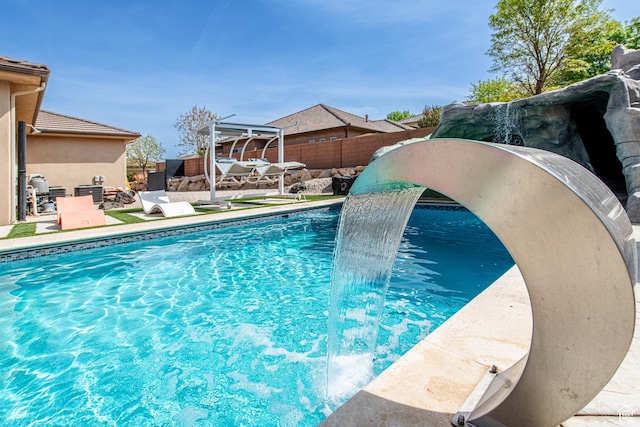 view of pool with a fenced backyard, a fenced in pool, and a patio area