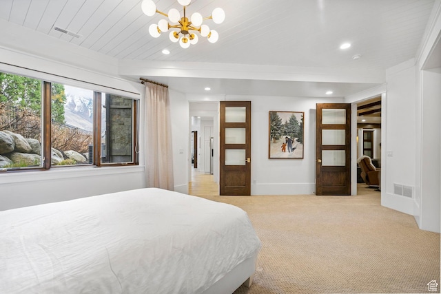 bedroom with a chandelier, light carpet, visible vents, and recessed lighting