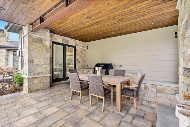 view of patio / terrace featuring outdoor dining area and grilling area