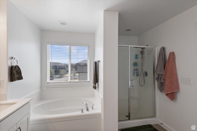 283 E Echo Ledge Dr S, Saratoga Springs, UT 84045 - bathroom with vanity, a stall shower, and a garden tub