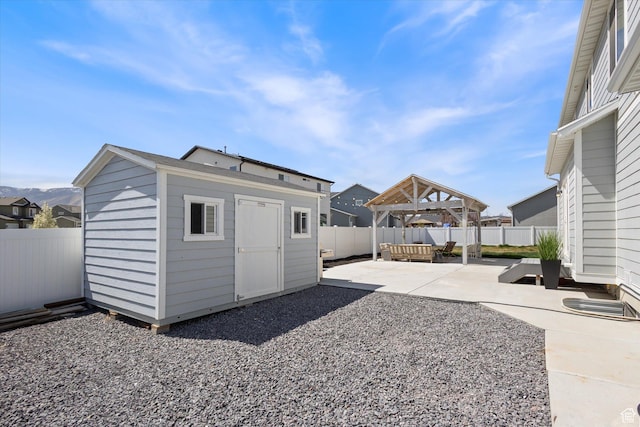 283 E Echo Ledge Dr S, Saratoga Springs, UT 84045 - view of shed featuring a gazebo and a fenced backyard