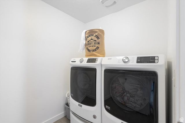 283 E Echo Ledge Dr S, Saratoga Springs, UT 84045 - laundry room featuring baseboards, laundry area, and washing machine and clothes dryer