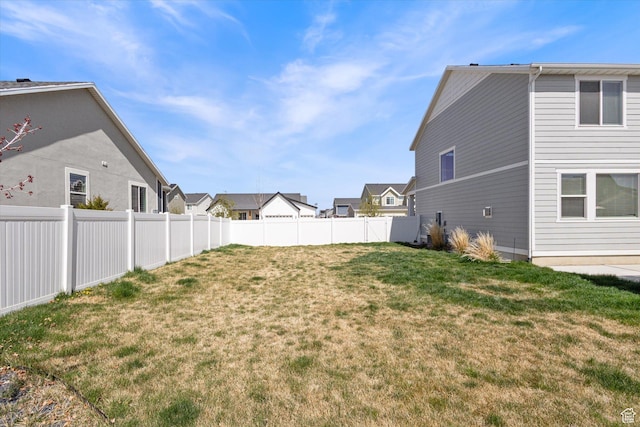 283 E Echo Ledge Dr S, Saratoga Springs, UT 84045 - view of yard with a fenced backyard and a residential view