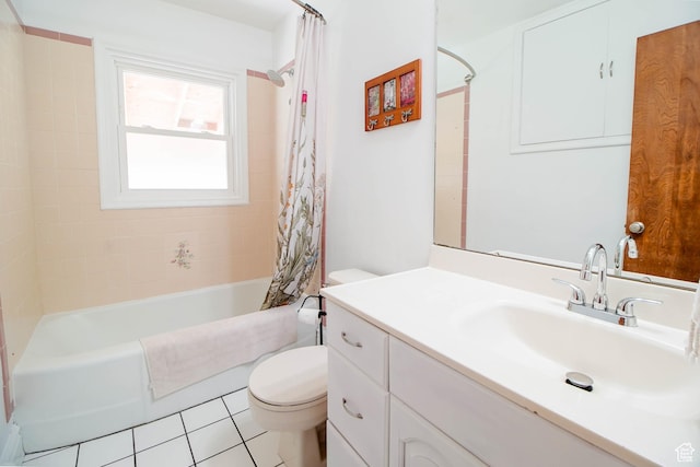 bathroom featuring toilet, shower / bath combo, vanity, and tile patterned flooring