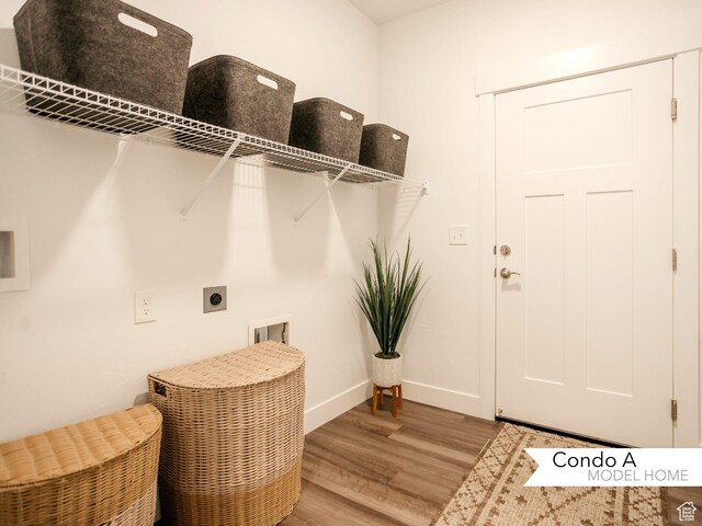 13741 S Hanley Ln Unit Ff101, Riverton, UT 84096 - laundry area with laundry area, wood finished floors, hookup for a washing machine, and electric dryer hookup