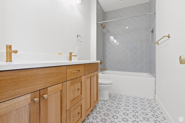 bathroom with toilet, vanity, and shower / tub combination