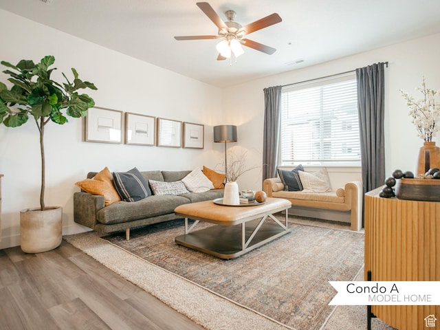 13741 S Hanley Ln Unit Ff102, Riverton, UT 84096 - living room with wood finished floors, ceiling fan, and visible vents