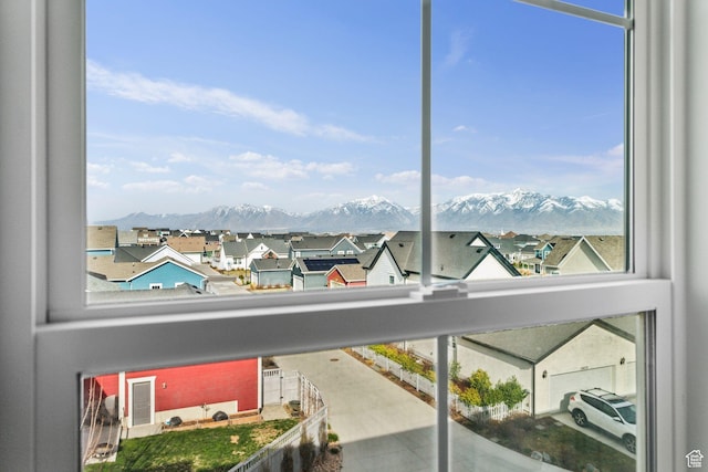 water view with a mountain view and a residential view