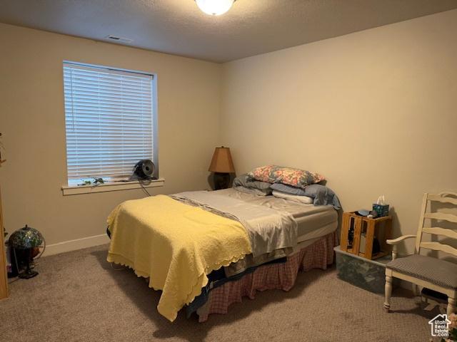 328 E 1100 S, Centerville, UT 84014 - carpeted bedroom featuring baseboards