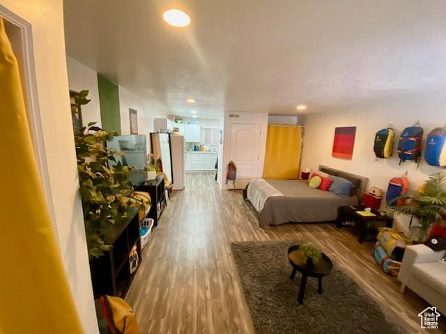 331 N 400 E, Logan, UT 84321 - bedroom with wood finished floors and recessed lighting