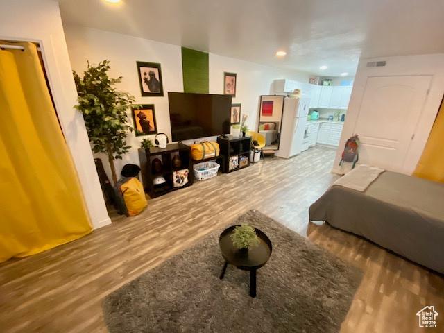 331 N 400 E, Logan, UT 84321 - living area featuring visible vents and wood finished floors