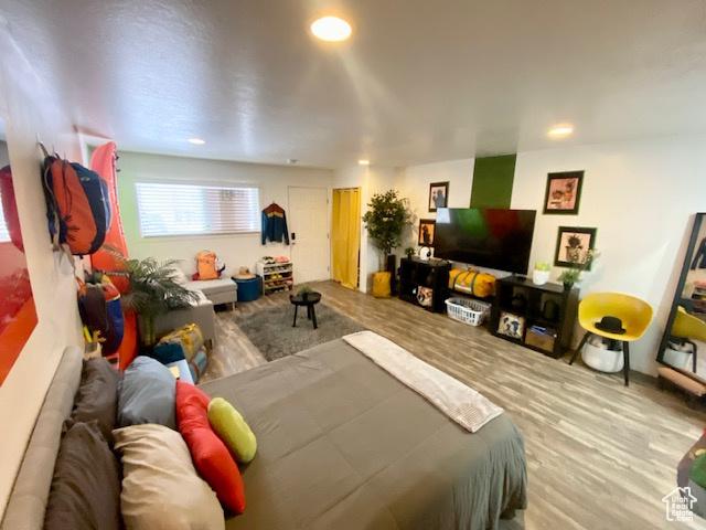 331 N 400 E, Logan, UT 84321 - bedroom featuring recessed lighting and wood finished floors