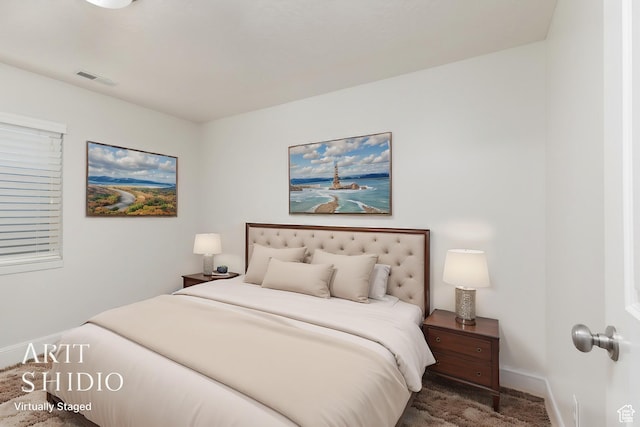 bedroom featuring carpet flooring, baseboards, and visible vents