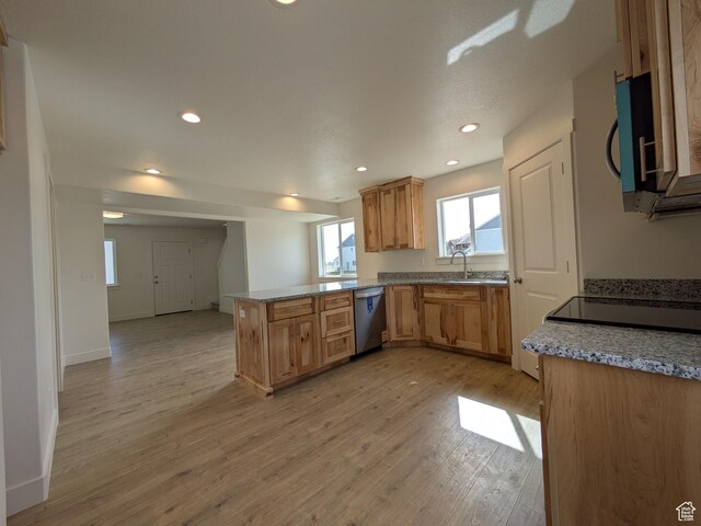 340 N 2650 W Unit 16, Tremonton, UT 84337 - kitchen with a peninsula, stainless steel dishwasher, recessed lighting, and light wood-style floors