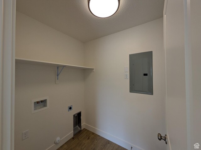 340 N 2650 W Unit 16, Tremonton, UT 84337 - laundry area with baseboards, washer hookup, electric panel, laundry area, and wood finished floors